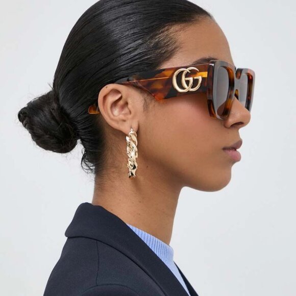 Gucci Brown and Gold Sunglasses Luxurious Designer Accessory